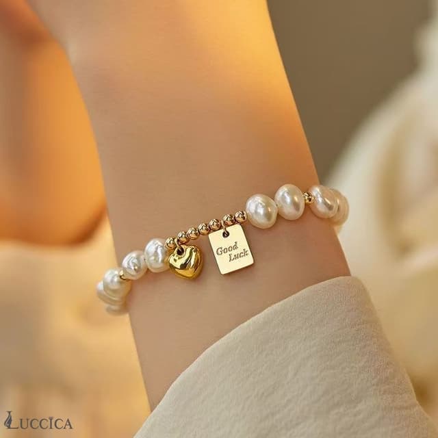 Luccica-สร้อยข้อมือเงินแท้ มุกน้ำจืดธรรมชาติ ทรงหัวใจสี่เหลี