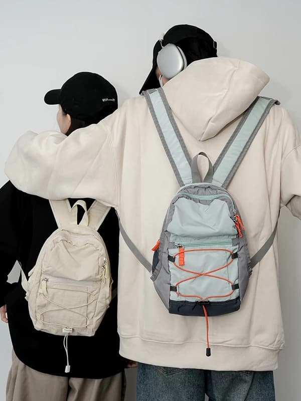 กระเป๋าเป้ไนล่อนมินิ รุ่น N202 สไตล์สปอร์ต ขนาดกะทัดรัด โทนสีตัดกัน จุของได้เยอะ (3สี ขาว เขียว ม่วง) https://wayoza.com