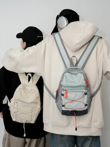 กระเป๋าเป้ไนล่อนมินิ รุ่น N202 สไตล์สปอร์ต ขนาดกะทัดรัด โทนสีตัดกัน จุของได้เยอะ (3สี ขาว เขียว ม่วง)