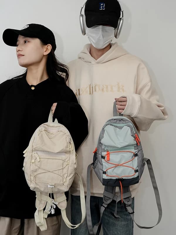 กระเป๋าเป้ไนล่อนมินิ รุ่น N202 สไตล์สปอร์ต ขนาดกะทัดรัด โทนสีตัดกัน จุของได้เยอะ (3สี ขาว เขียว ม่วง) https://wayoza.com