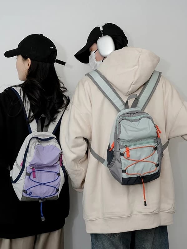 กระเป๋าเป้ไนล่อนมินิ รุ่น N202 สไตล์สปอร์ต ขนาดกะทัดรัด โทนสีตัดกัน จุของได้เยอะ (3สี ขาว เขียว ม่วง) https://wayoza.com